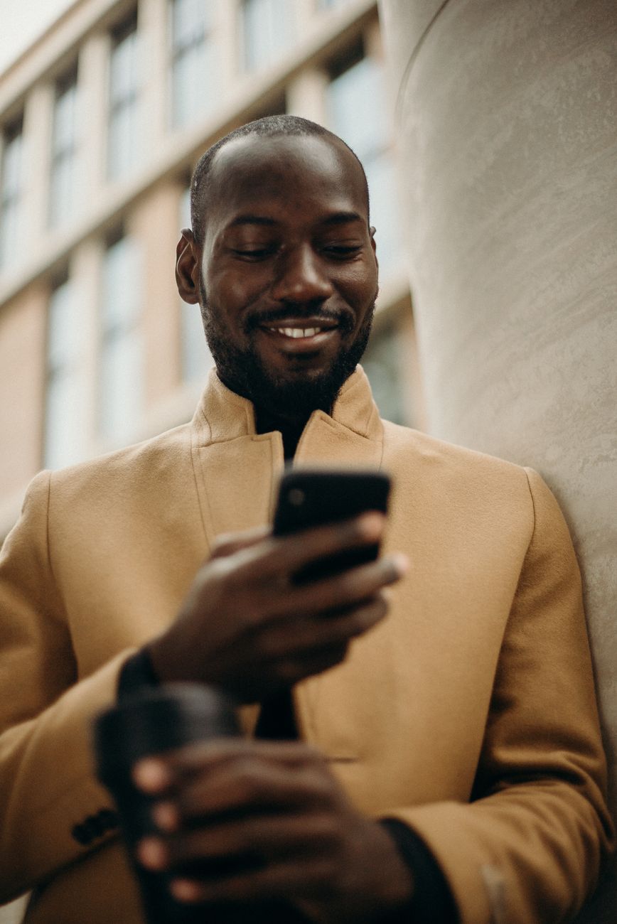 Creator checking earnings on his phone